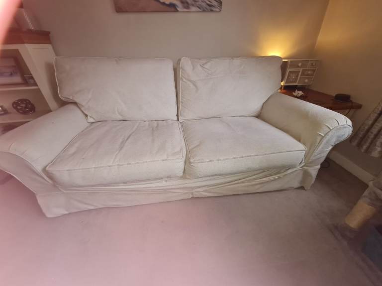 Cream sofa with removable covers 