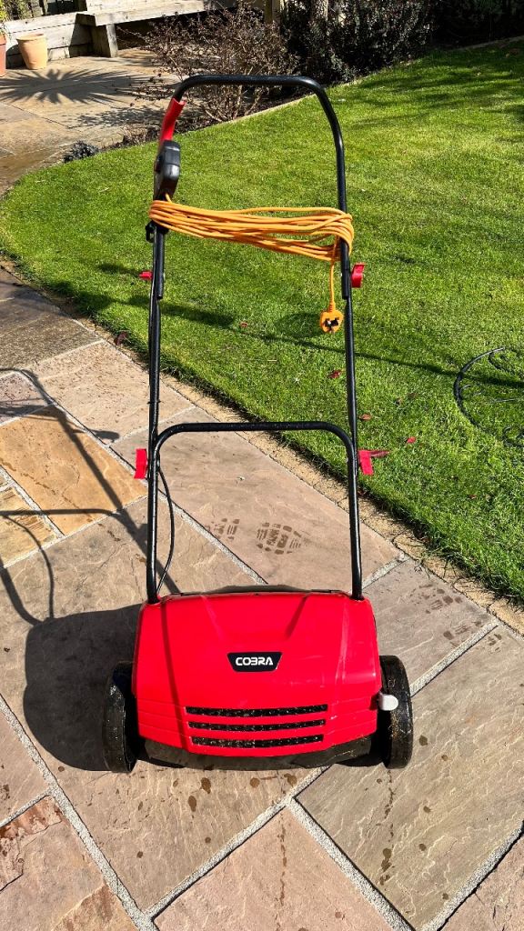 Lawn scarifier and aerator