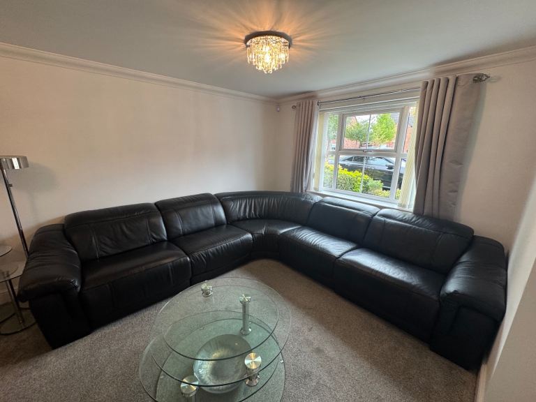 Black Italian leather sofa