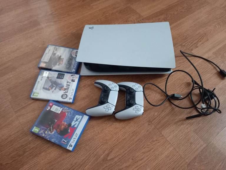 Sony PlayStation 5 Console with Two Controllers and Games