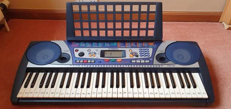Keyboard with music stand
