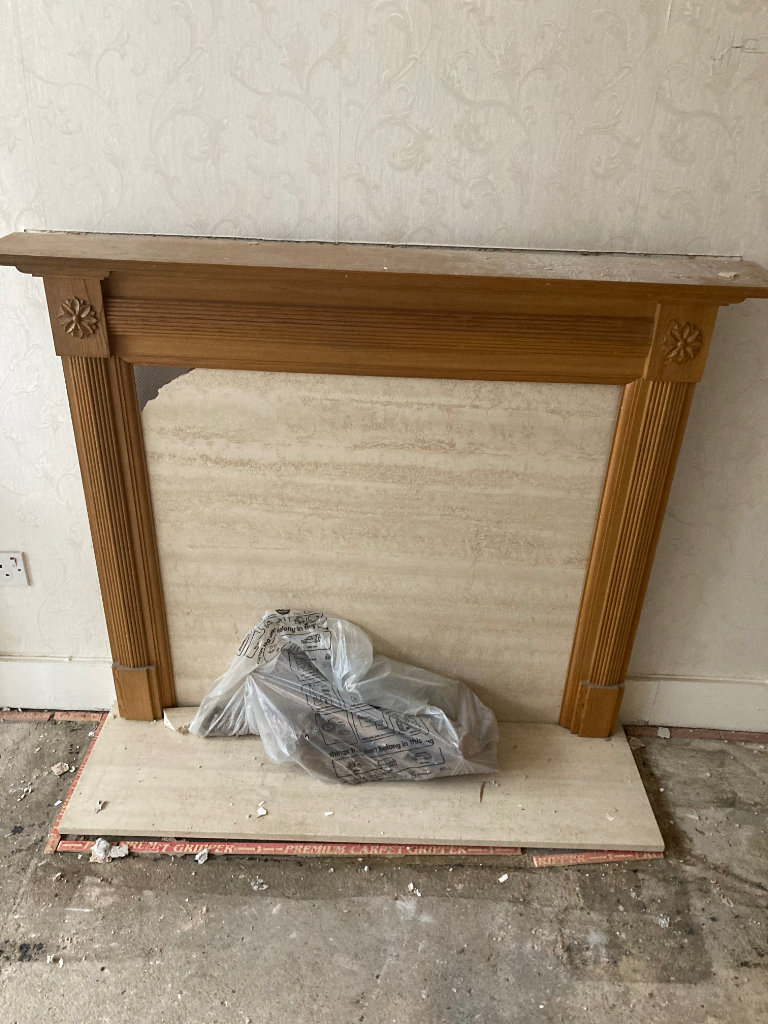 Beautiful pine fire place surround with stone plates