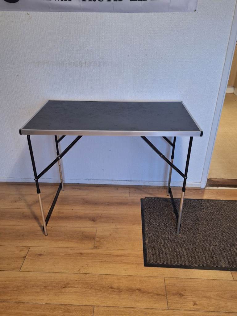 2 folding tables ( sold together)
