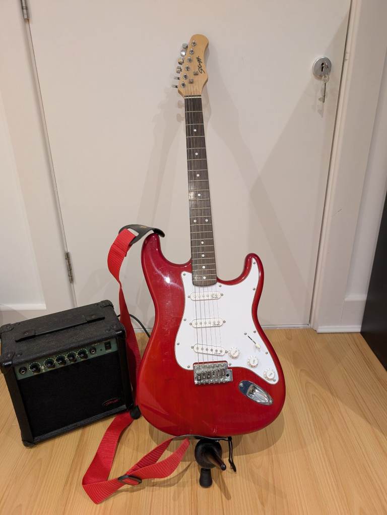 Stagg electric guitar with amp and bag