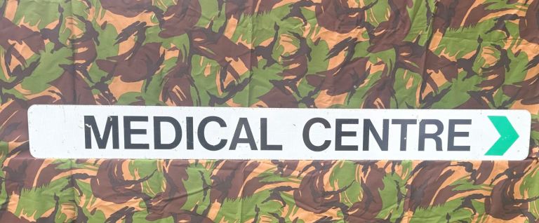 Medical Centre Sign - White with Green Arrow