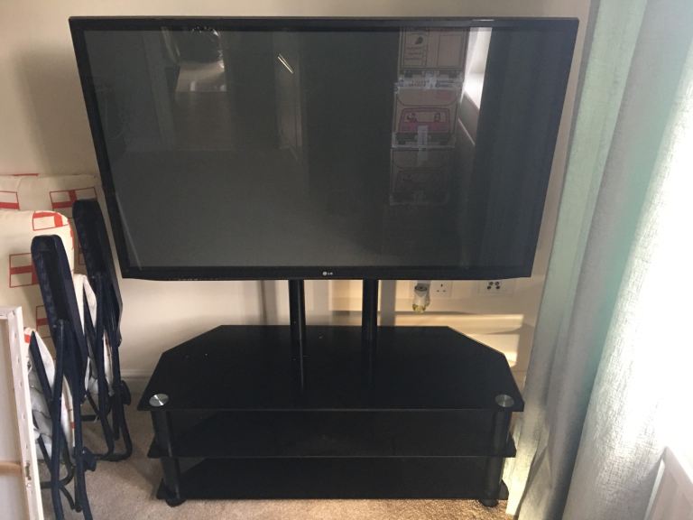 LG 50 inch plasma tv and glass stand 