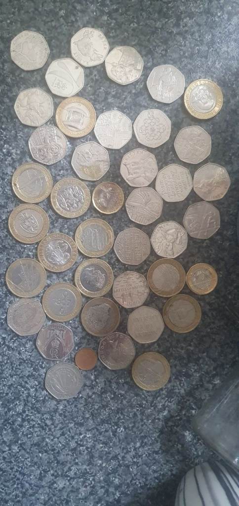 Benjamin bunny 50ps & Paddington bear £2 coins 