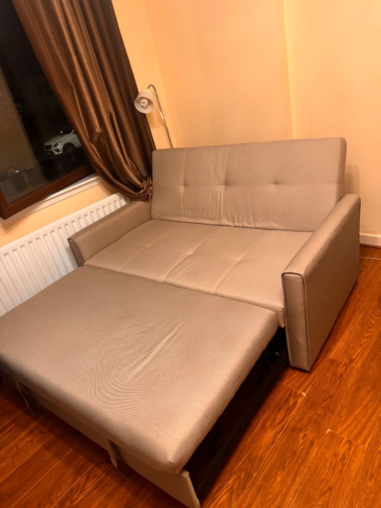 Compact Beige Sofa Bed – Ideal for Guests or Small Spaces