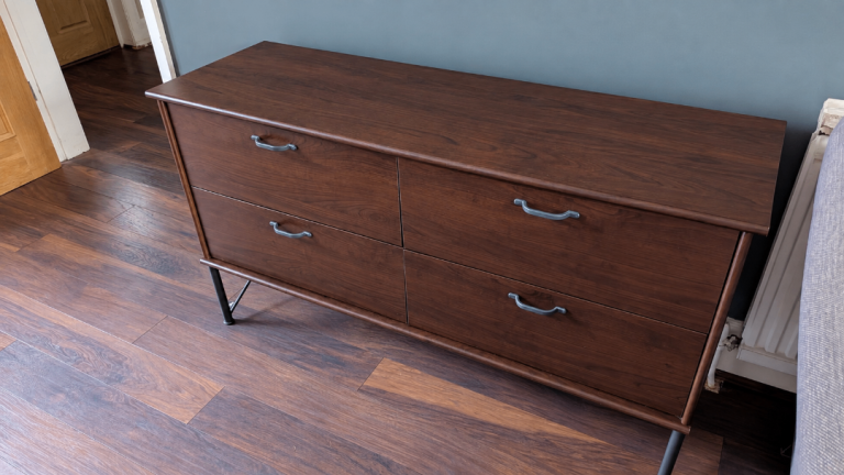 Dark wood sideboard with 4 drawers 