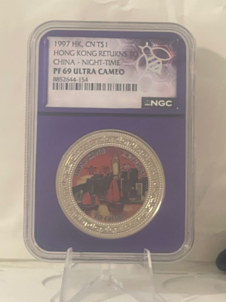1997 Hong Kong Returns to China Commemorative Coin - PF 69 Ultra Cameo. 999 Fine 