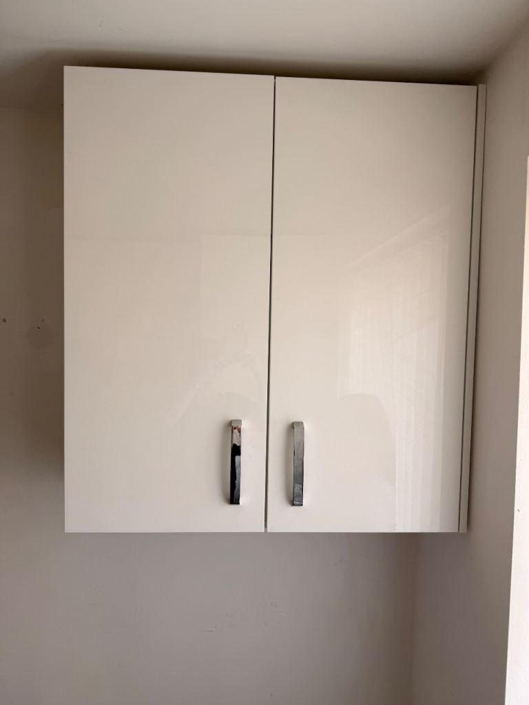 White Wall-Mounted Storage Cabinet with Shelves