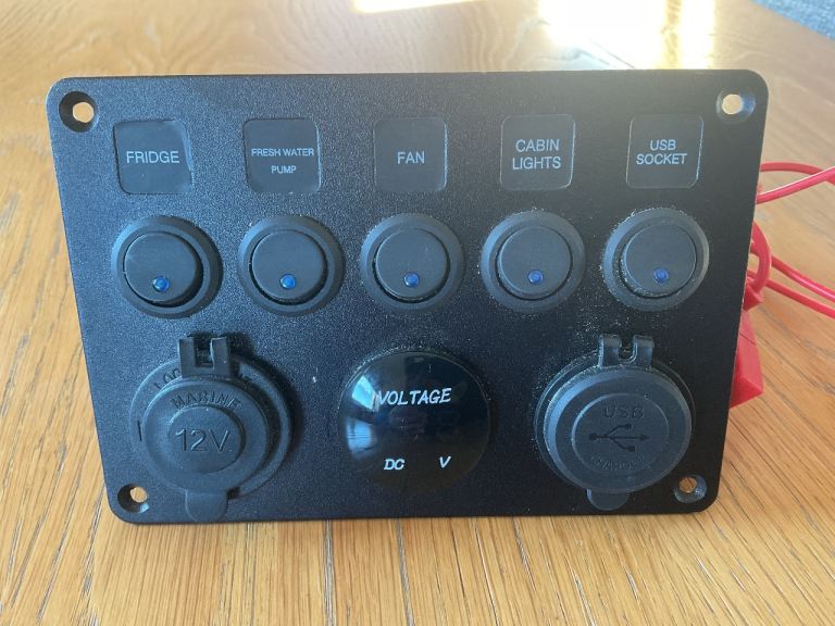 5-Gang IP65 Waterproof Switch Panel 12V/24V Toggle switches, dual USB & digital voltmeter.