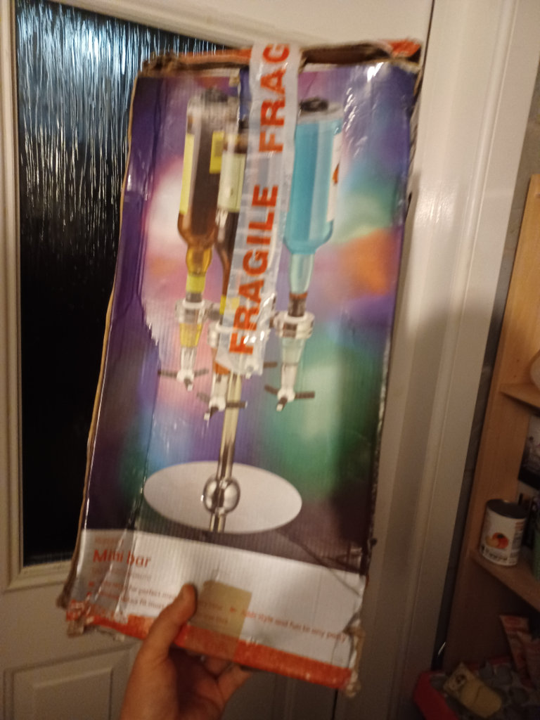 Rotating chrome mini bar