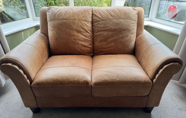Comfortable Two-Seater Brown Leather Sofa – Good Condition