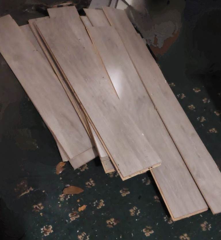 Offcuts of laminate 12mm flooring eurohome b and q grey covers approx 6m2