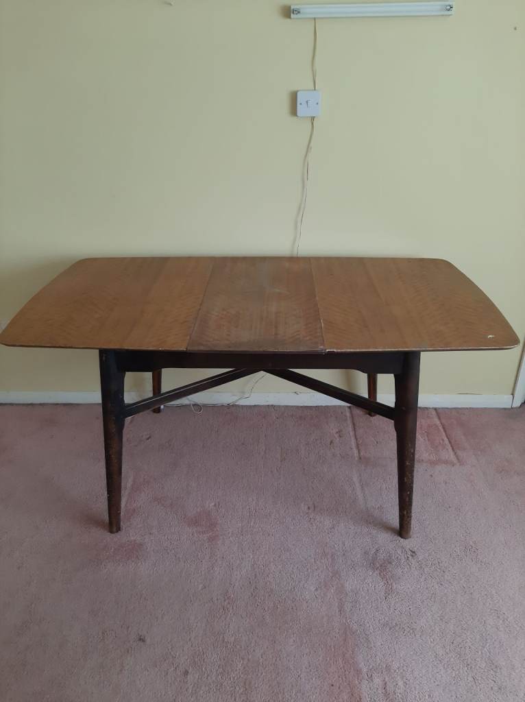 Vintage extendable wooden dining table