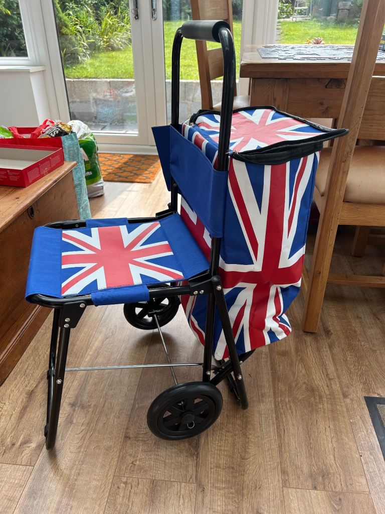 Union Jack shopping trolley with seat collapsible. 