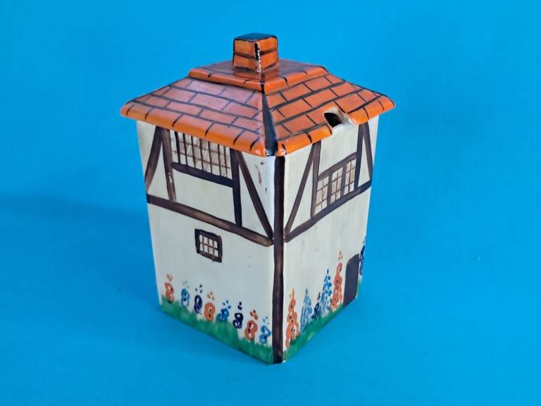Vintage Hancocks Ivory Ware biscuit jar, designed in the shape of a pub or cottage. 