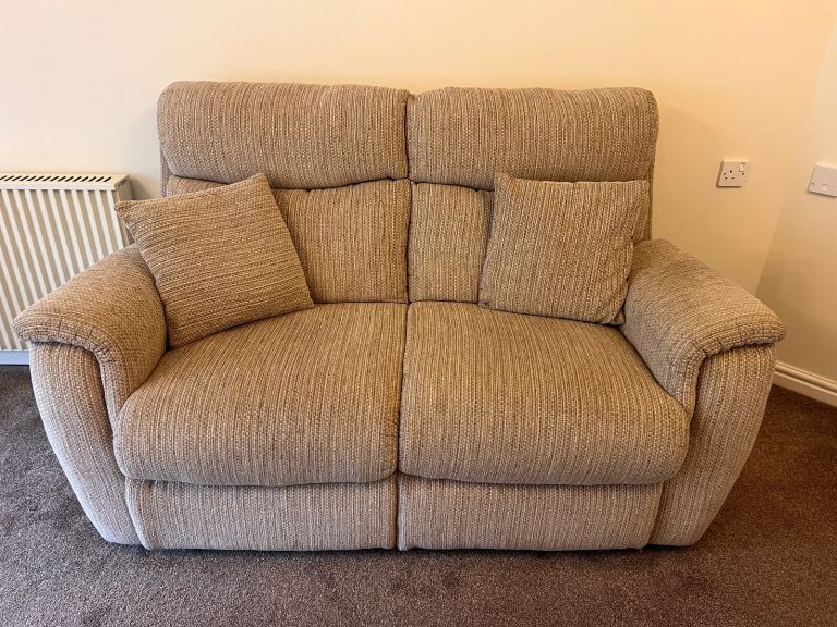 2 seater beige sofa with matching cushions 