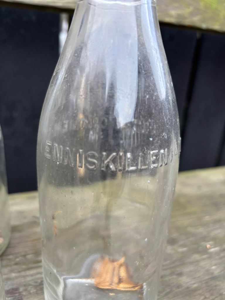 9 old glass milk bottles 