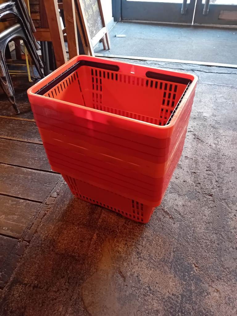Free to collect 11 Stackable Red Plastic Shopping Baskets – Good Condition