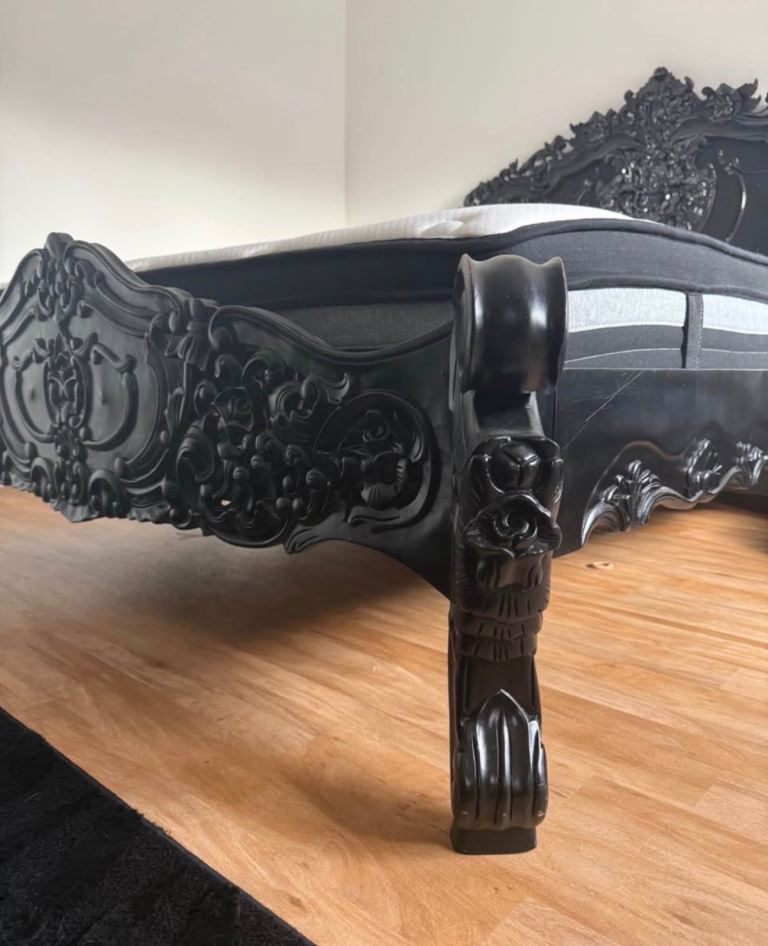 Ornate black king size bed 