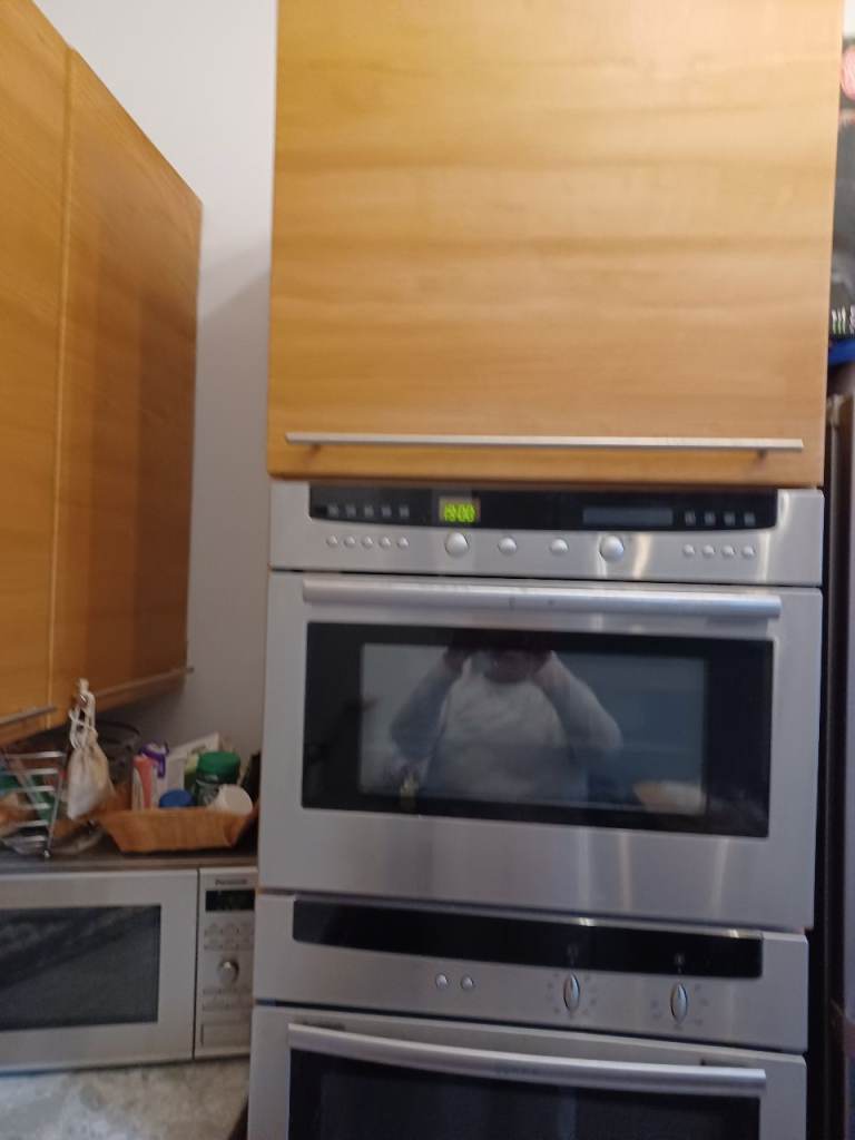 Tall kitchen housing unit/Neff double oven 