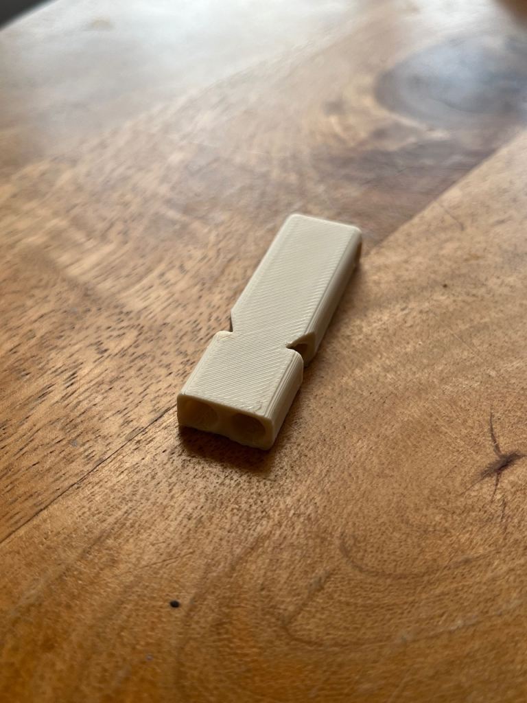Small Beige Plastic Whistle – New