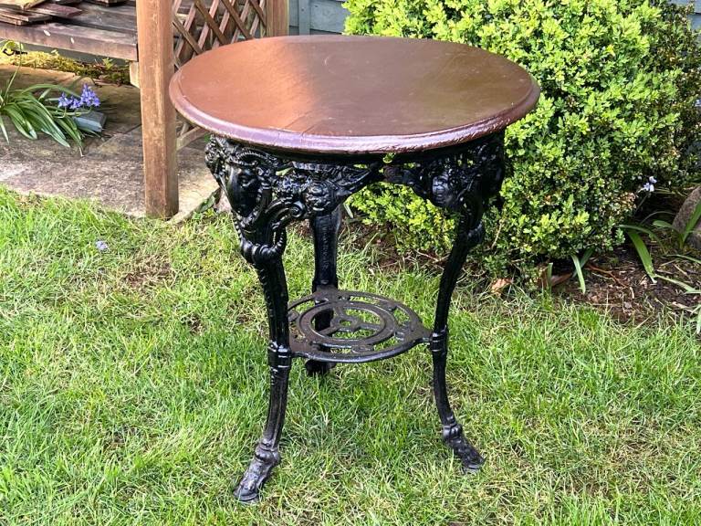 Cast iron ram's head design pub table