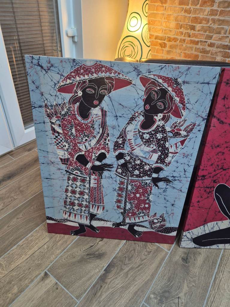 Four batik pictures on wooden frames