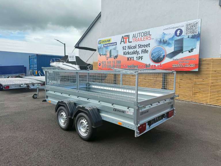 BRAND NEW ZASLAW 10FT X 5FT TWIN AXLE TRAILER WITH 40CM MESH 750KG UN BRAKED