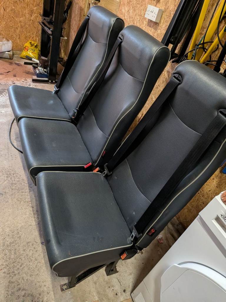 Rear van seats with built in seats belts and brackets 
