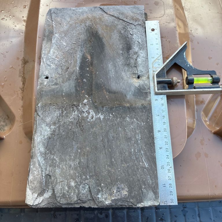 Roofing slates used 13“ x 7“ all with nail holes.