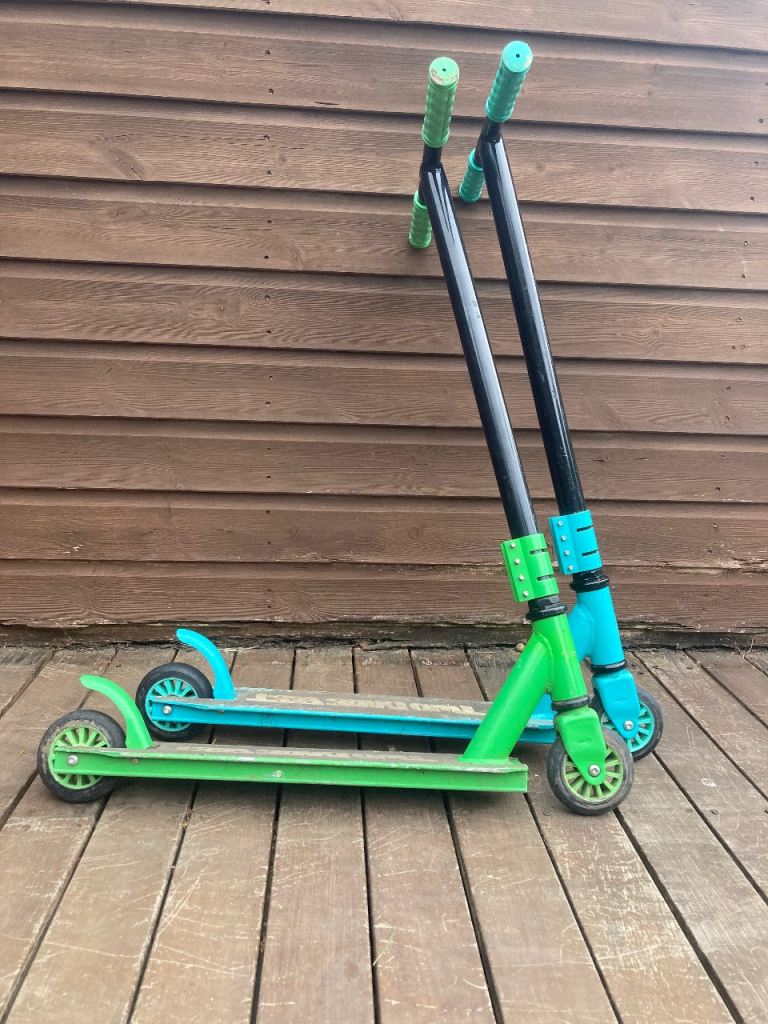2 set of scooters green and blue for 8-11 year olds great condition COLLECTION ONLY 