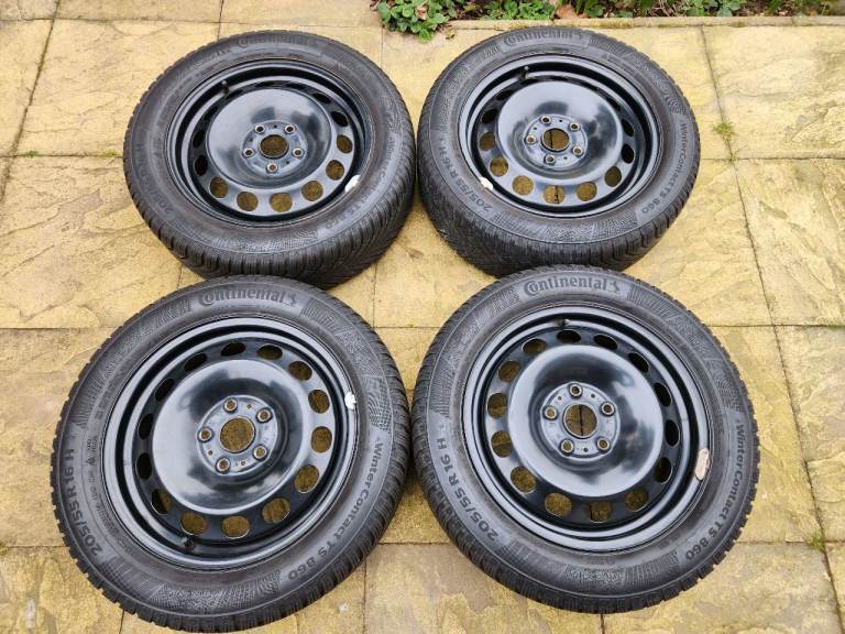 Full set of Continental Winter Contact TS 860 205/55 R16 H Winter Tyres on black steel wheels. 