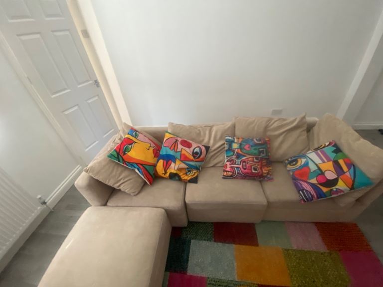 Beige Corner Sofa with Footstool – Good Condition