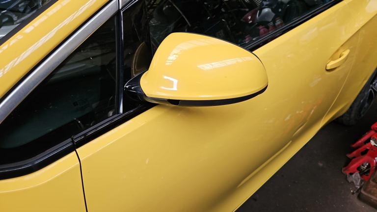 Vauxhall Astra GTC.  Passenger door mirror Yellow Breaking parts 