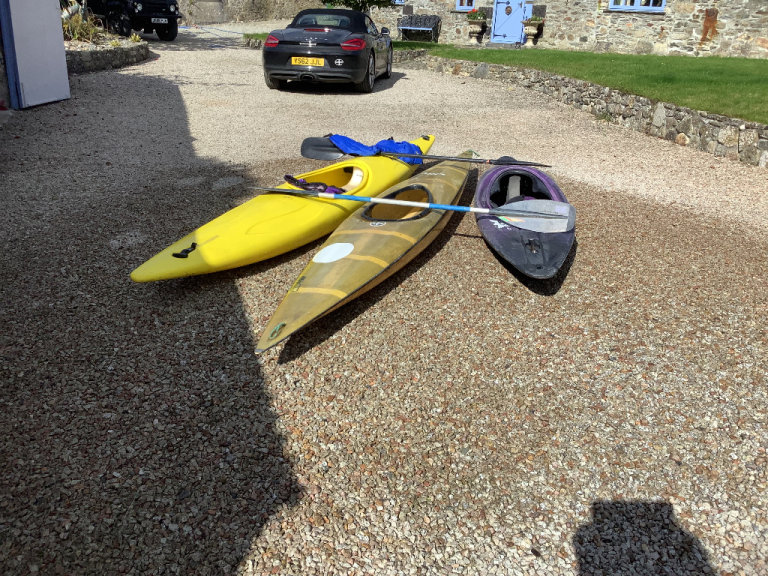 Three kayaks for sale.