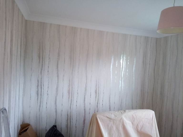 Wallpapering available
