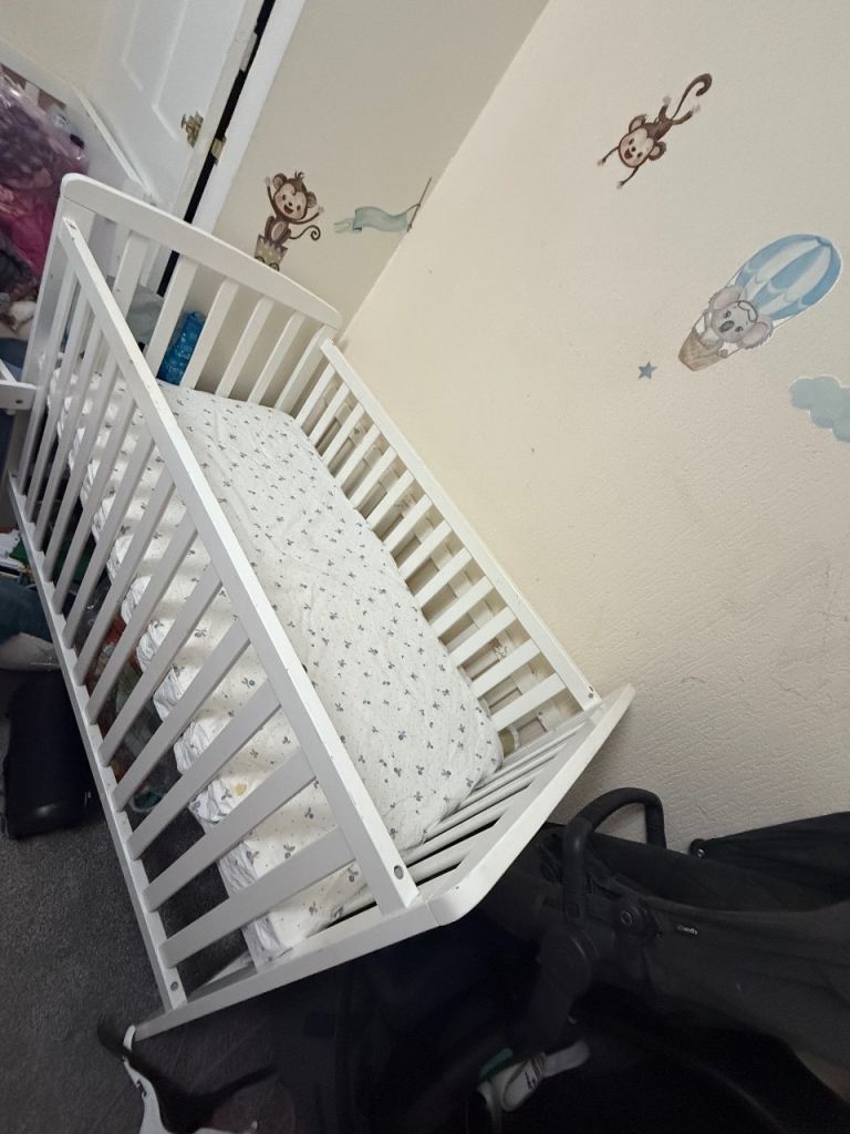 Baby cot with changing table 