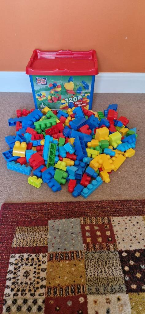  188 MEGA BLOKS IN STORAGE CONTAINER. EXCELLENT CONDITION.