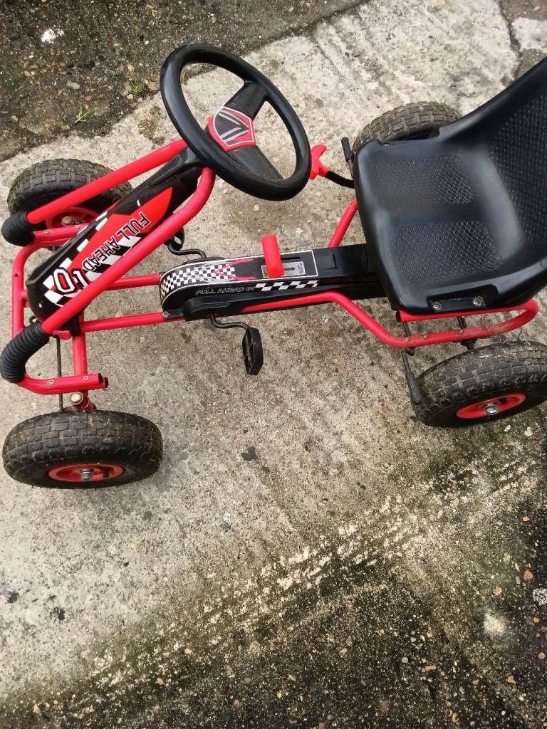 Childs pedal car forward and reverse