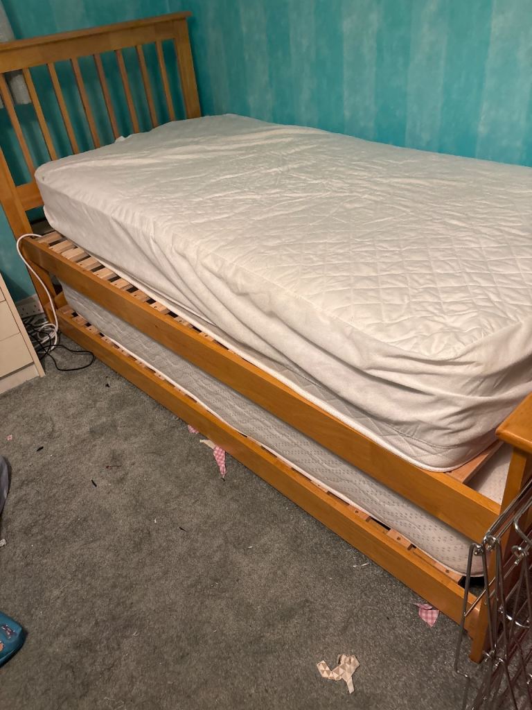 Single bed with truckle bed underneath 