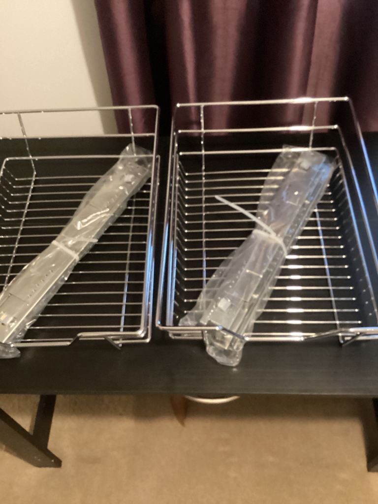 Chrome on steel sliding kitchen cupboard storage