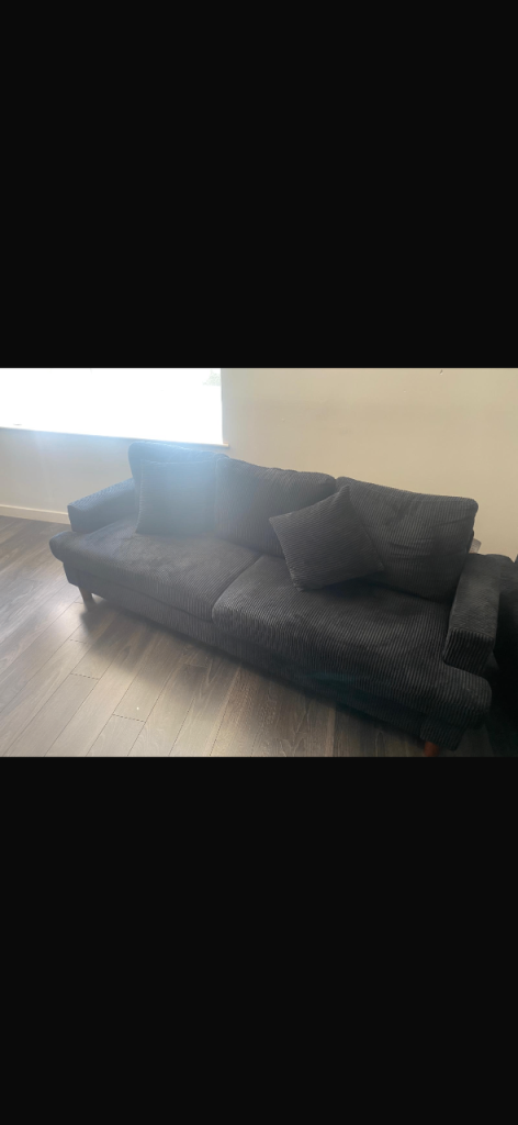 Comfortable Black Fabric Sofa – Good Condition