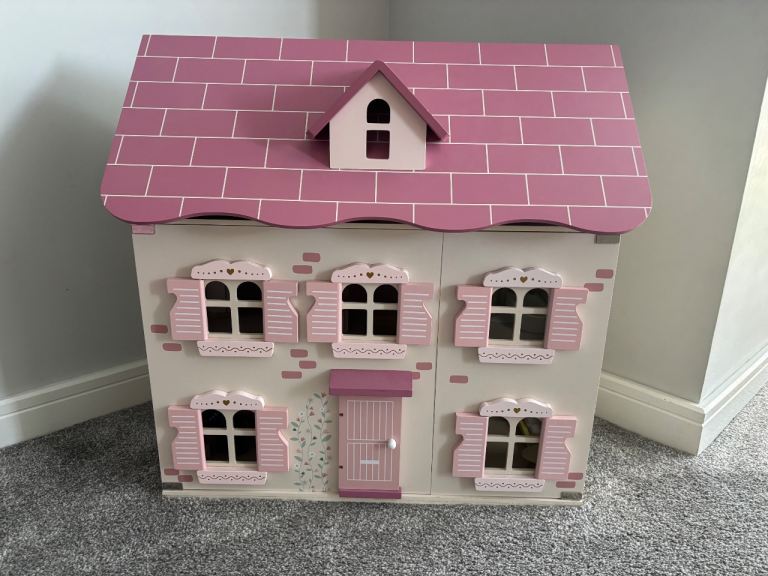 Wooden dolls house, immaculate condition £30
