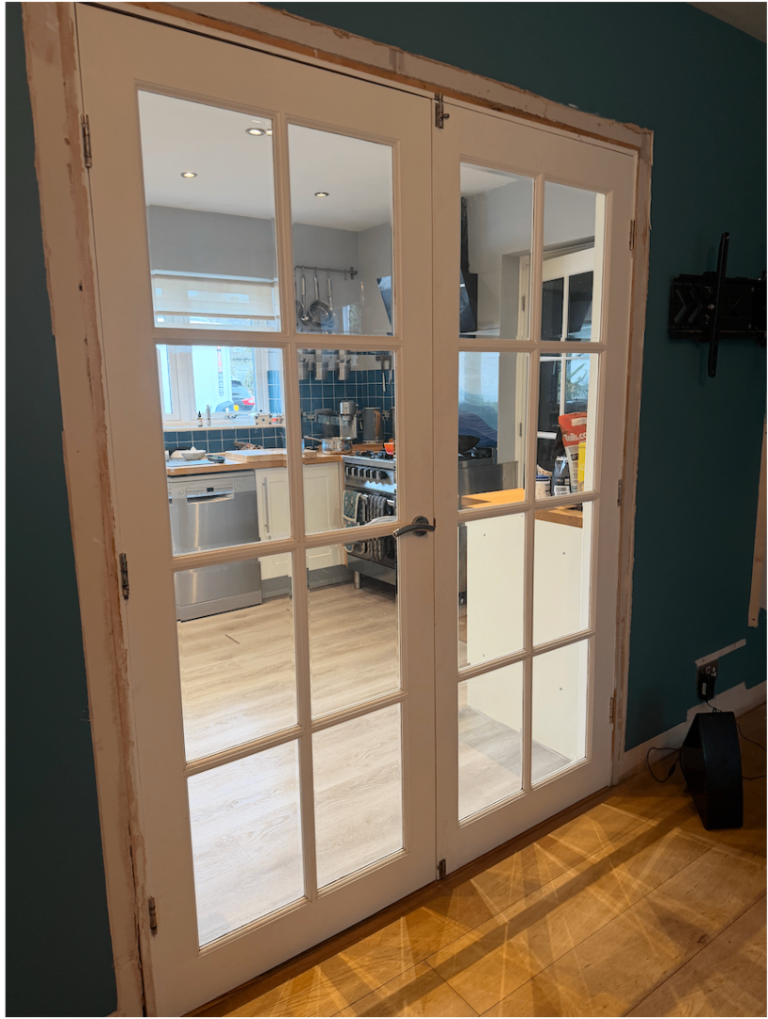 Used white painted pine doors (x2) , with eight glass panels 