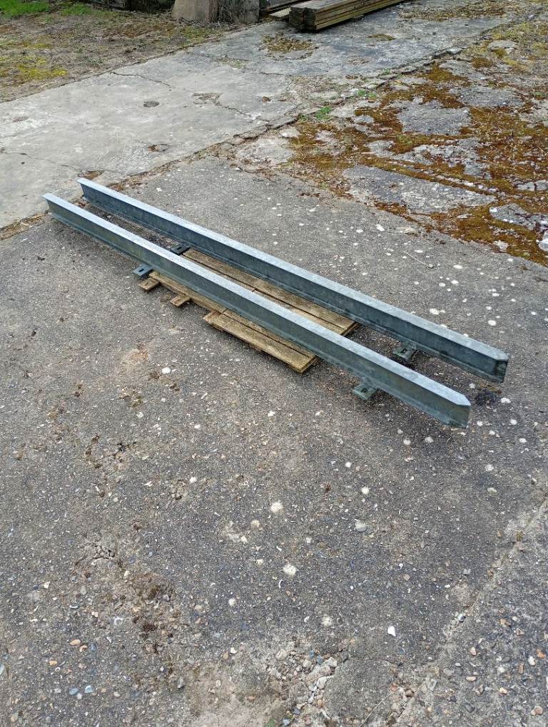 2 Heavy galvanized steel fence posts. 230cms long x 10cms wide. Collect Capel-le-Ferne.x