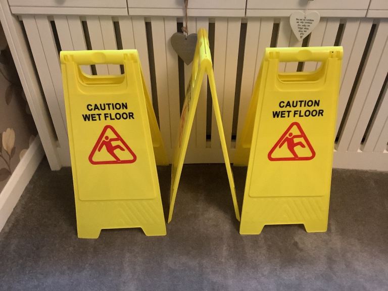 3 caution wet signs  as new as just stored in van have got many more 