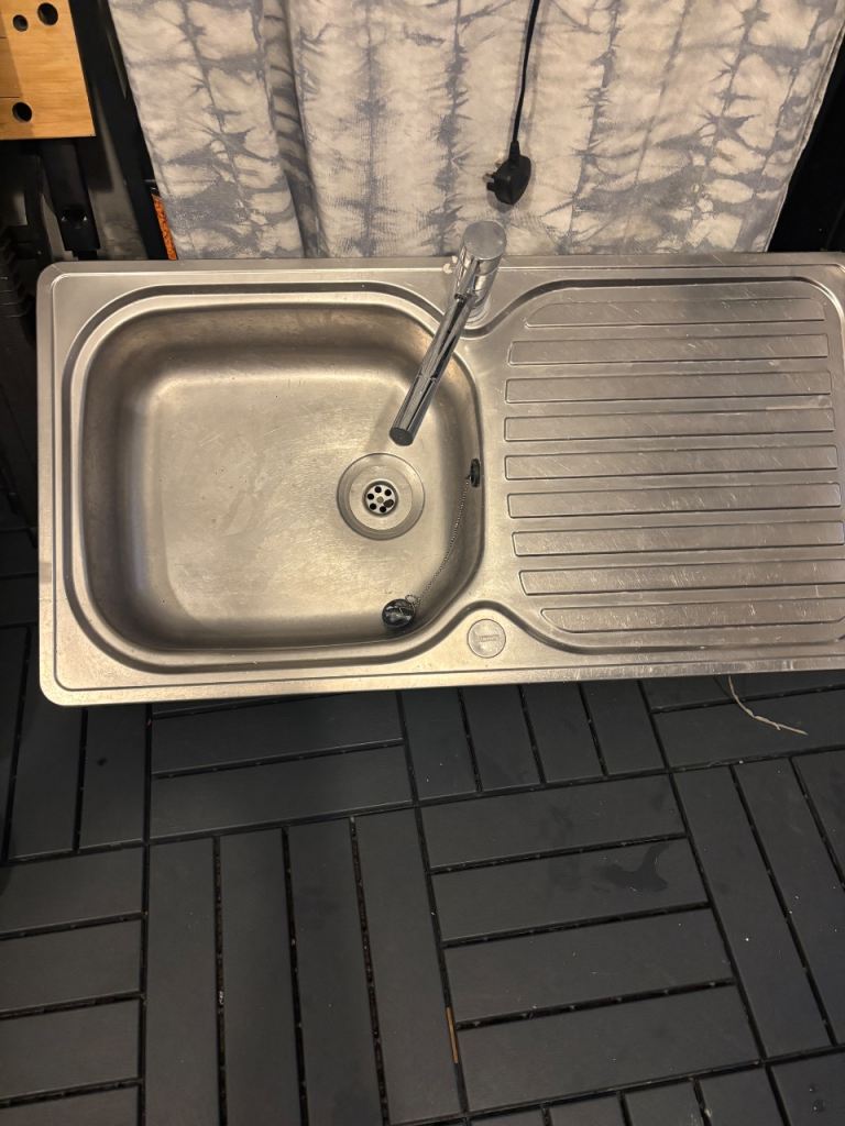 Stainless steell sink with mixer tap 